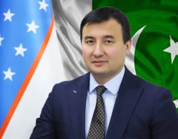 Uzbekistan Deputy Prime Minister Jamshid Khodjaev speaking during a bilateral conference representing trade relations