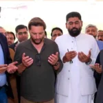Former cricketer Shahid Afridi receiving a shield at the inauguration of the National Institute of Leather Technology in Karachi.