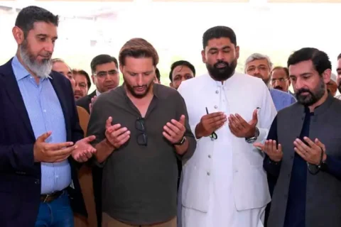 Former cricketer Shahid Afridi receiving a shield at the inauguration of the National Institute of Leather Technology in Karachi.