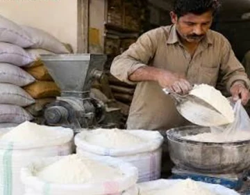 Bags of wheat flour in a market.
