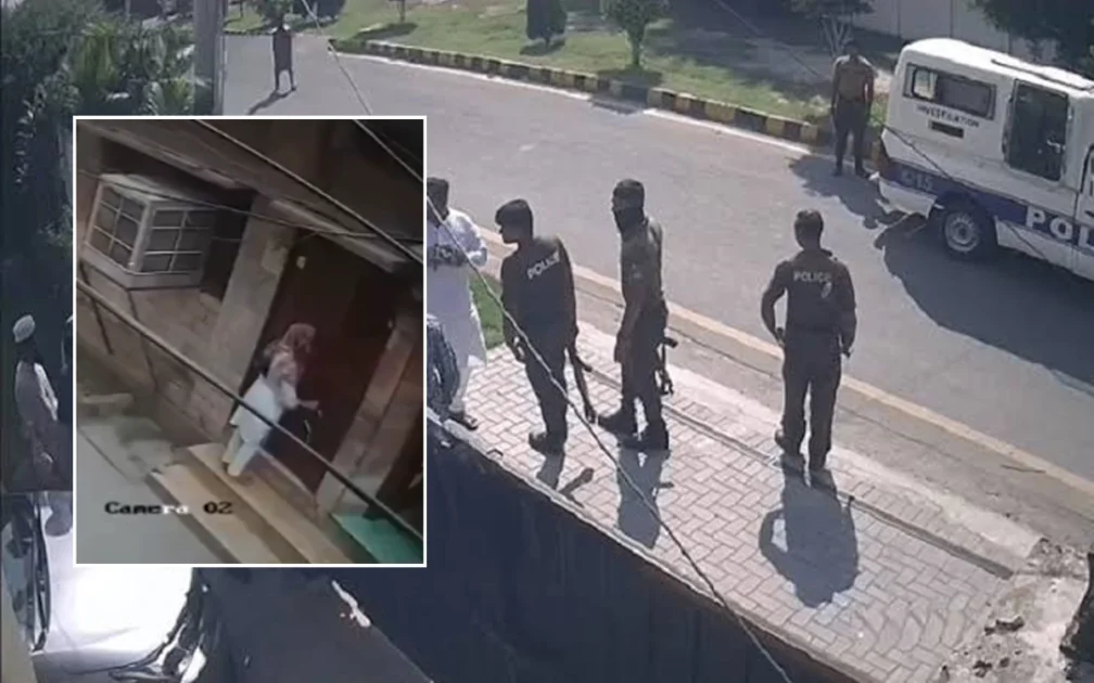 Lahore police officers standing in a street during a crime scene investigation and suspect search operation