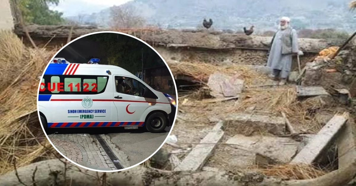 Rescue 1122 workers clearing the debris of a collapsed house in Kohat after heavy rains