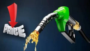 Fuel nozzle pouring petrol at a gas station in Pakistan.