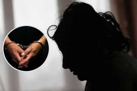 Punjab police officials escorting arrested suspects at a local police station.