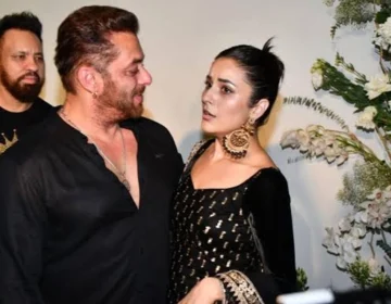 Shehnaaz Gill and Salman Khan sharing a candid moment on stage