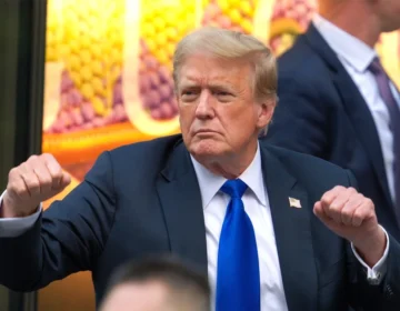 US President Donald Trump speaking angrily to reporters inside the Air Force One airplane.