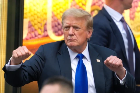 US President Donald Trump speaking angrily to reporters inside the Air Force One airplane.