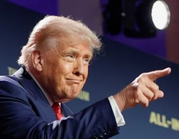 US Secret Service agents surrounding President Donald Trump during a high-security event under foreign threats.