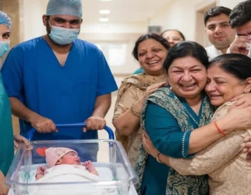 Happy family emotional celebration tears of joy upon newborn baby girl arrival at home