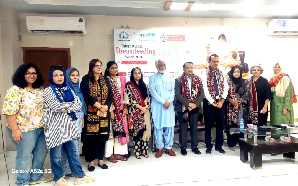Medical experts and journalists addressing audience at World Breastfeeding Week seminar in Karachi