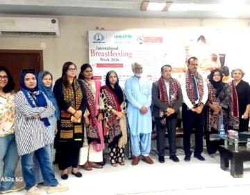 Medical experts and journalists addressing audience at World Breastfeeding Week seminar in Karachi