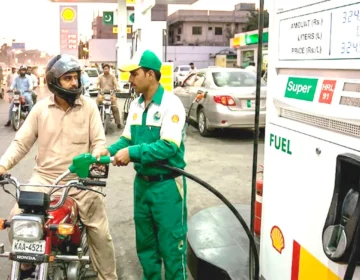 A sleek visual graphic depicting fuel pumps with green down arrow for petrol and red up arrow for diesel representing price adjustments without text