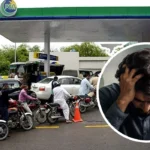 Petrol station in Pakistan displaying fuel price hike notice amid IMF negotiations