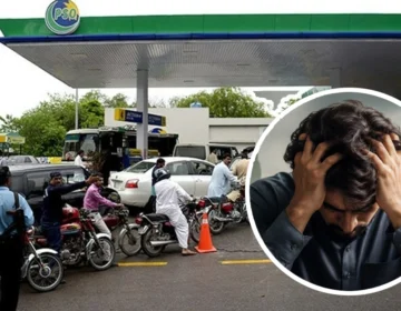 Petrol station in Pakistan displaying fuel price hike notice amid IMF negotiations