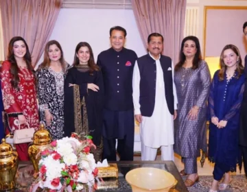 Pakistani actress Kiran Khan and husband Mirza Ishtiaq Baig posing at their family dinner